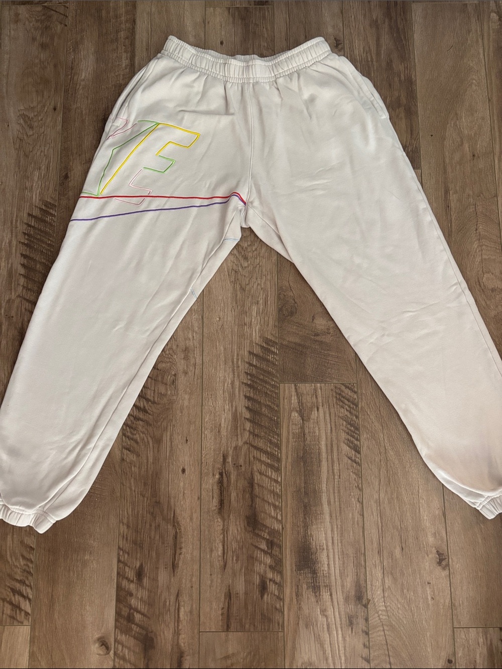 Nike White Joggers with Neon Rainbow Outline
